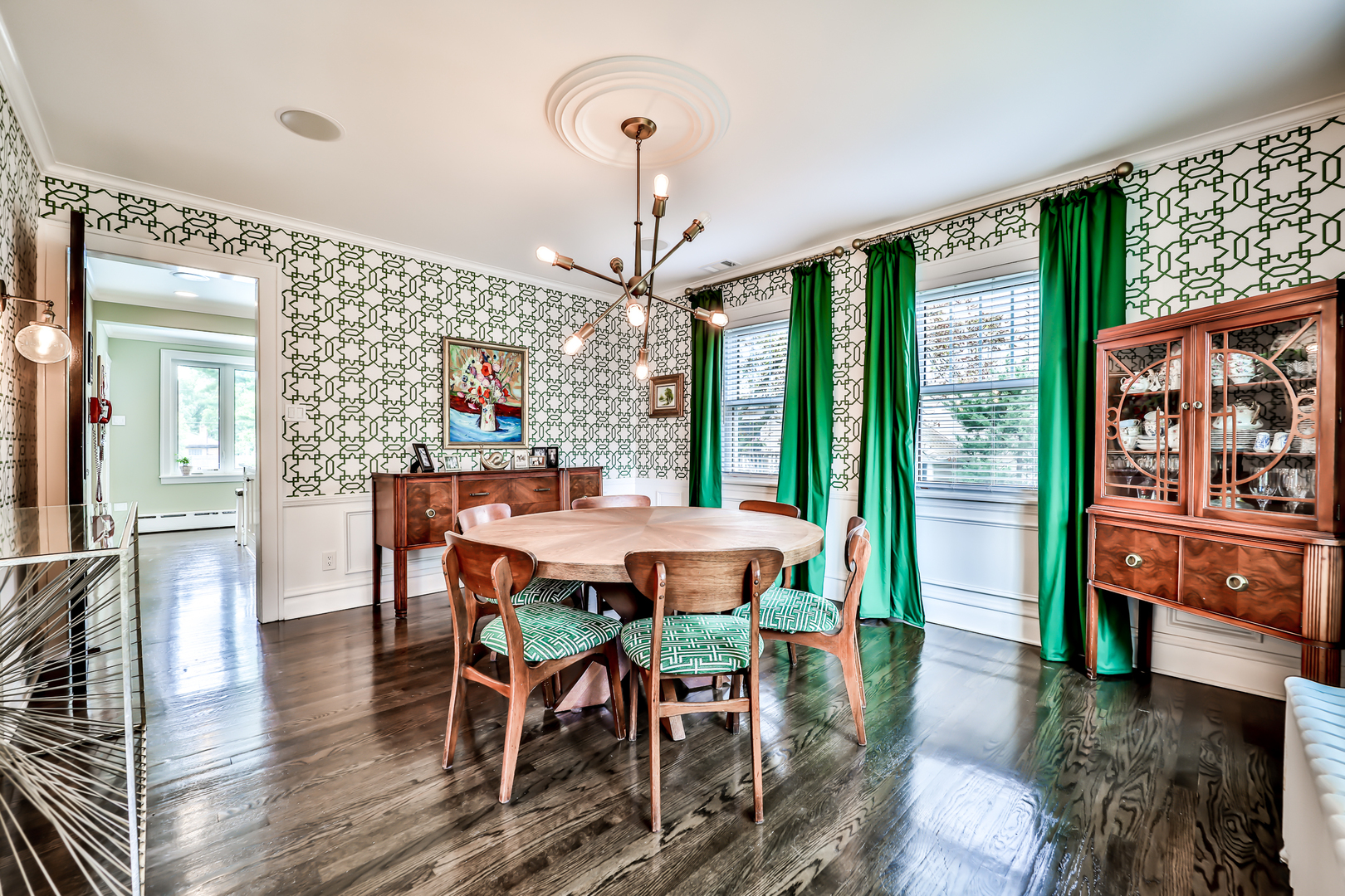 147 Herrick Road Riverside, IL 60546 - Photo 13 of 55 a dining room with furniture a chandelier and wooden floor