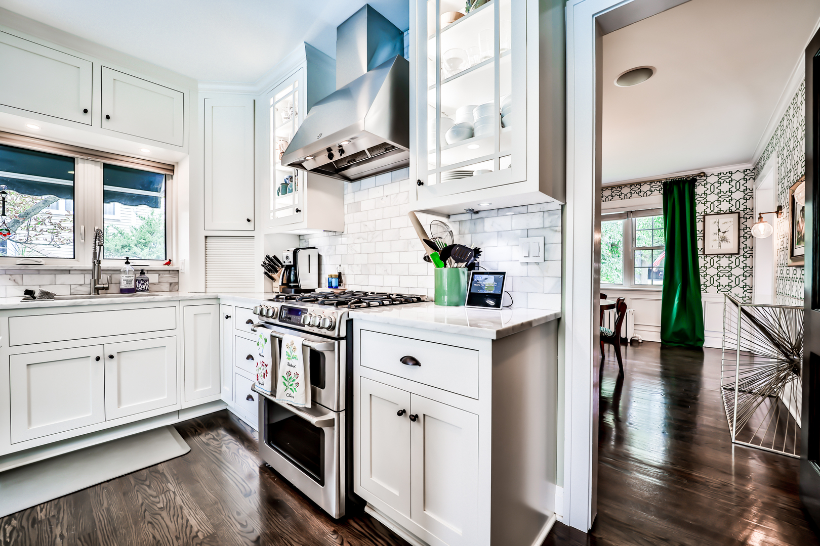 147 Herrick Road Riverside, IL 60546 - Photo 17 of 55 a kitchen with stainless steel appliances white cabinets and wooden floors