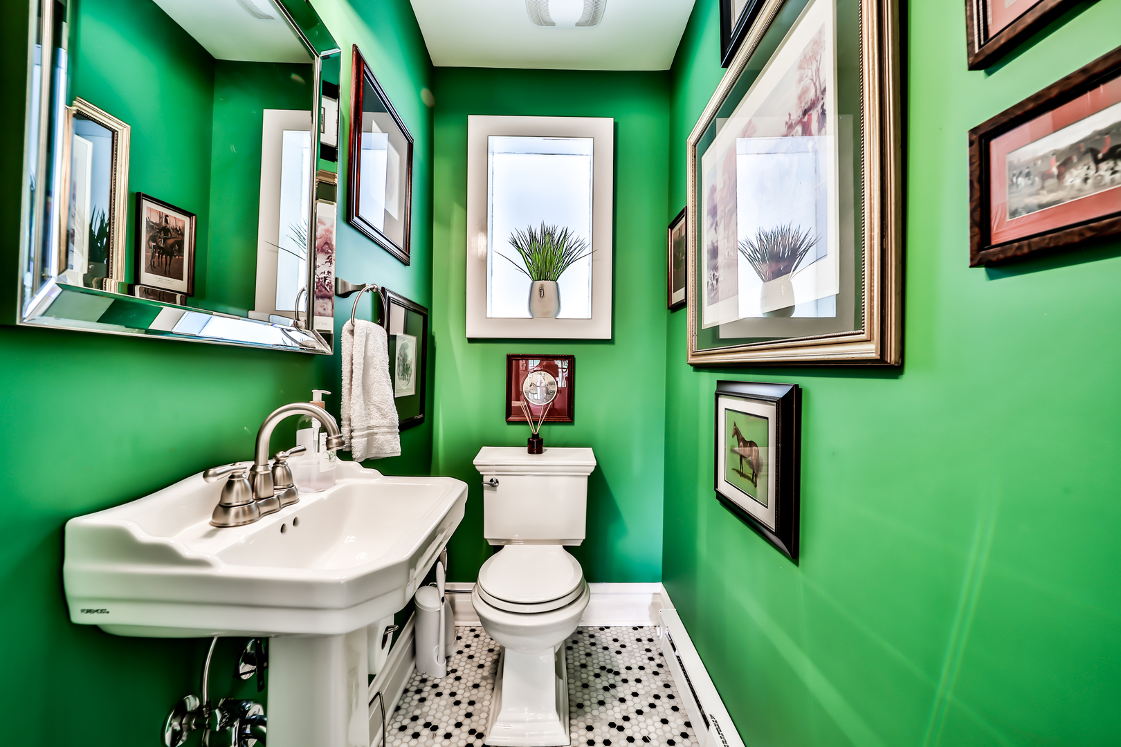 147 Herrick Road Riverside, IL 60546 - Photo 23 of 55 a bathroom with a toilet sink and mirror