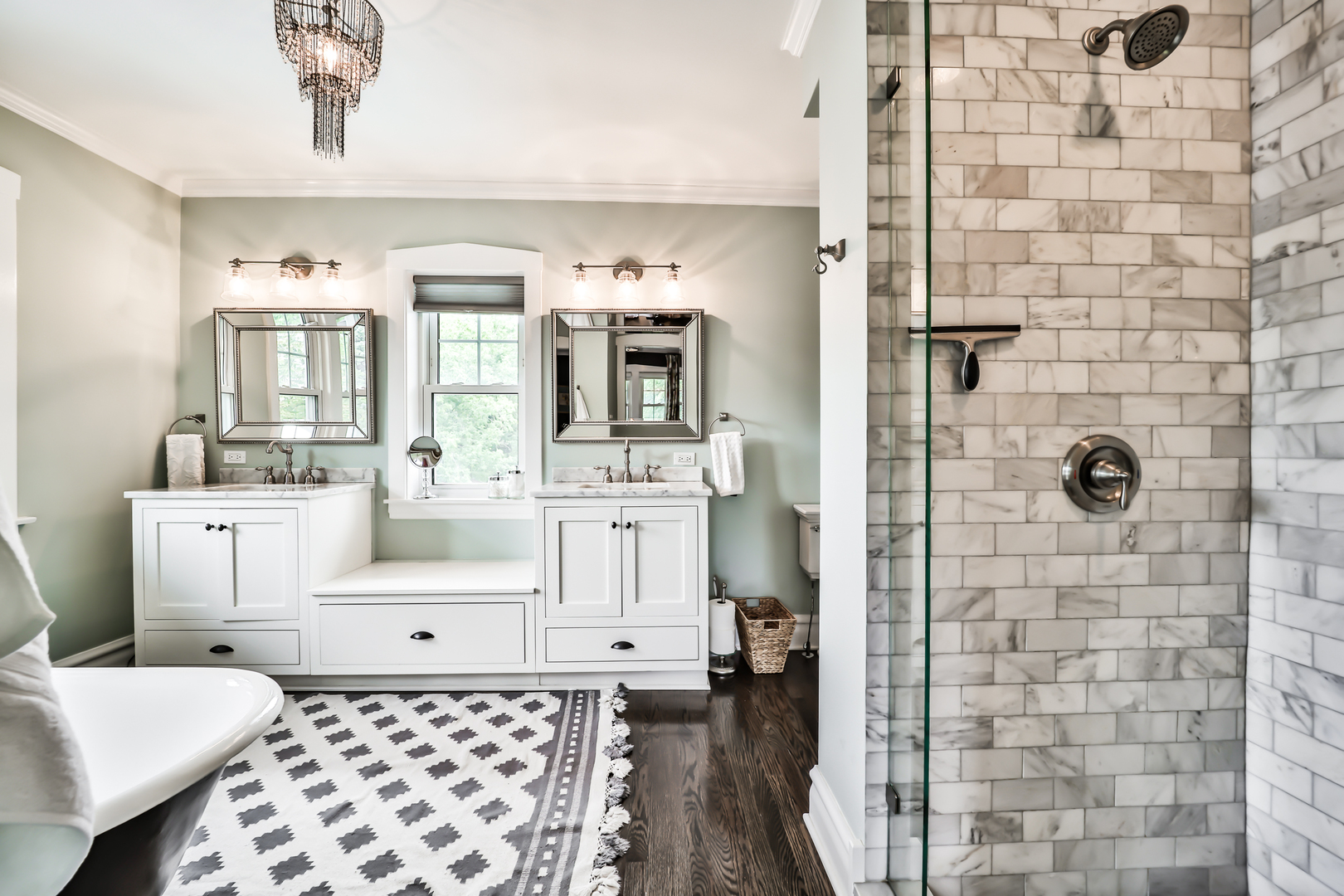147 Herrick Road Riverside, IL 60546 - Photo 28 of 55 a bathroom with a sink a mirror and shower