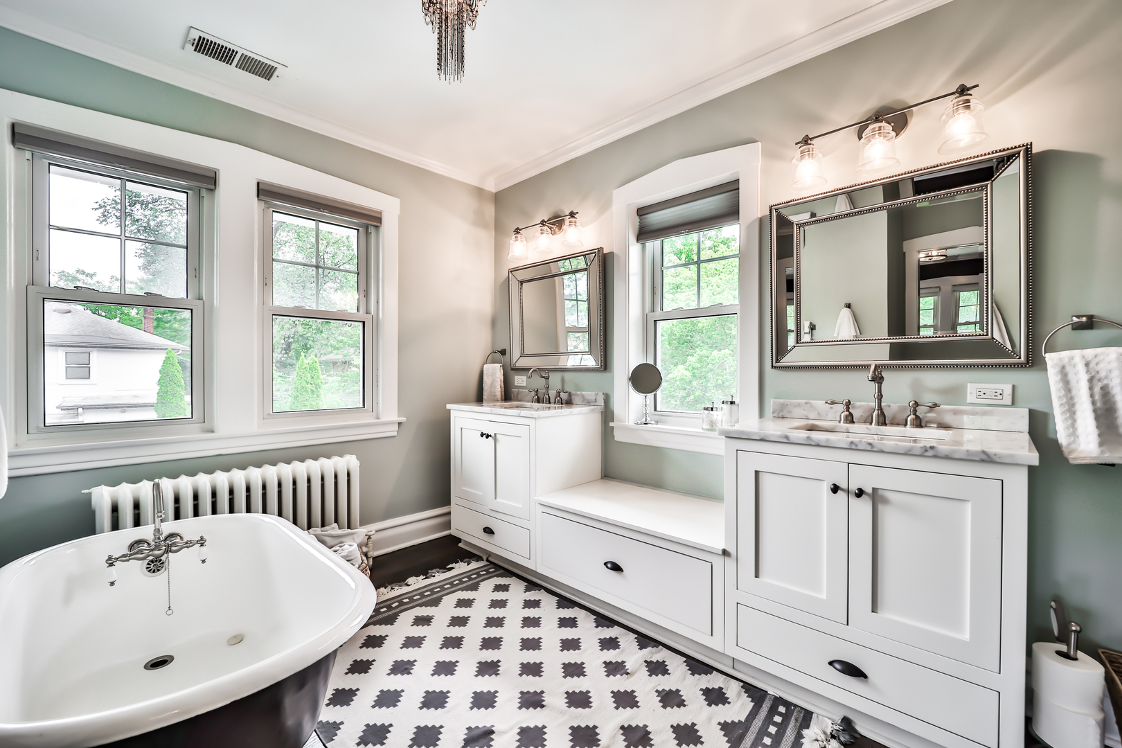 147 Herrick Road Riverside, IL 60546 - Photo 29 of 55 a en suite bathroom with double vanity sink a mirror and a bathtub