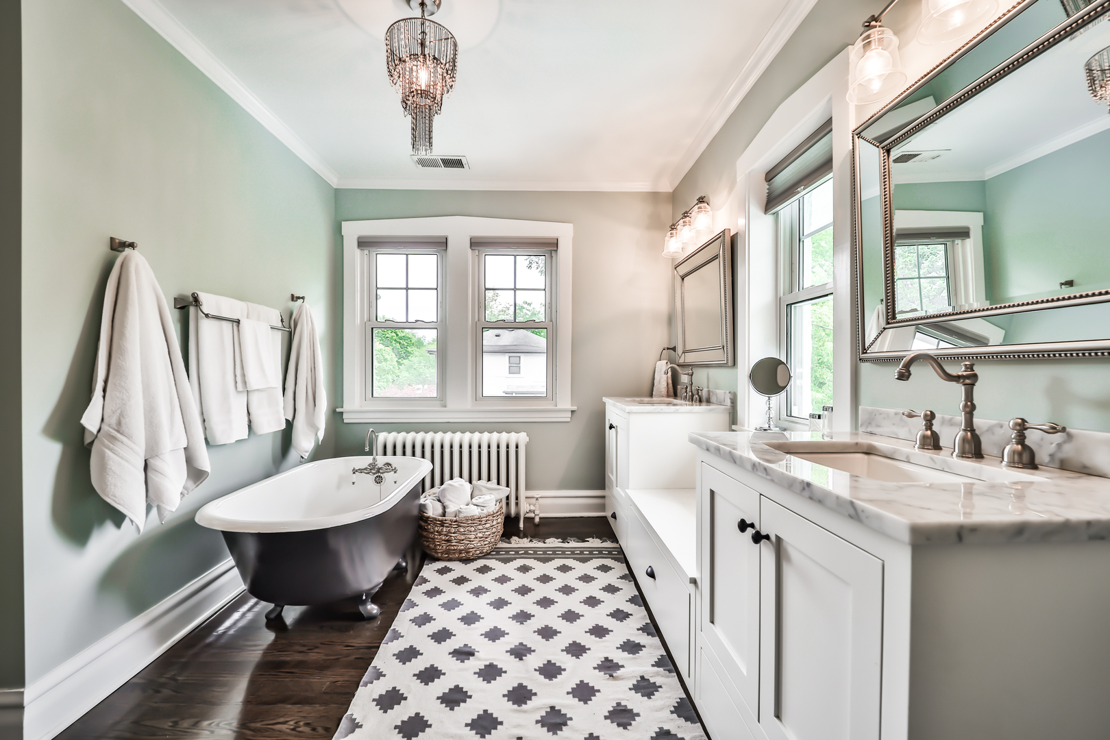 147 Herrick Road Riverside, IL 60546 - Photo 31 of 55 a bathroom with a double vanity sink a toilet and a window