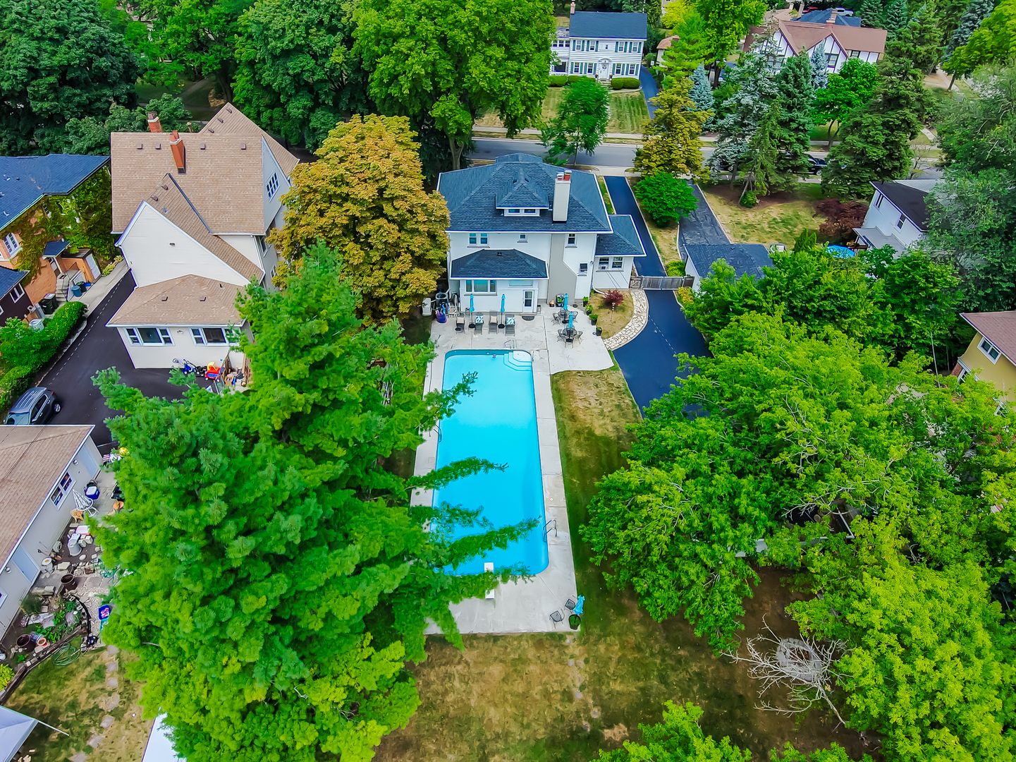147 Herrick Road Riverside, IL 60546 - Photo 46 of 55 an aerial view of house with yard swimming pool and outdoor seating