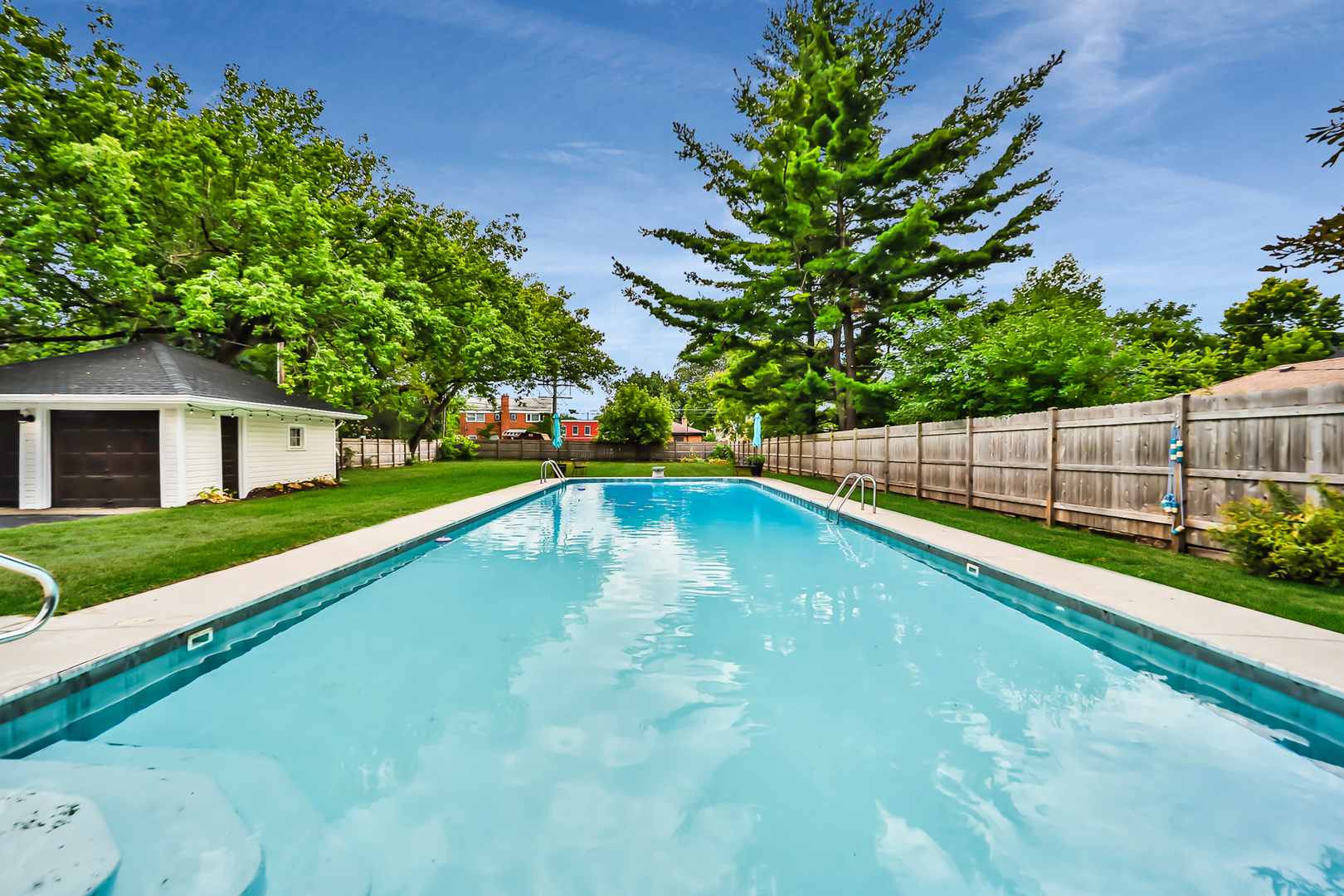 147 Herrick Road Riverside, IL 60546 - Photo 50 of 55 a view of a backyard with a small swimming pool