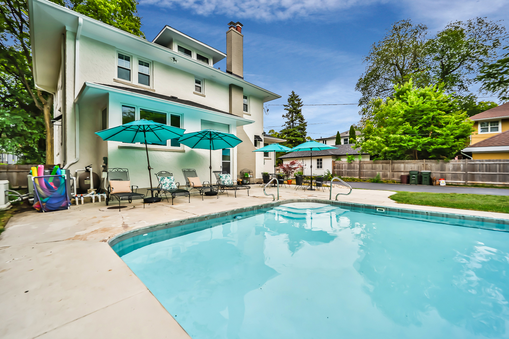 147 Herrick Road Riverside, IL 60546 - Photo 51 of 55 a view of a swimming pool with lounge chair