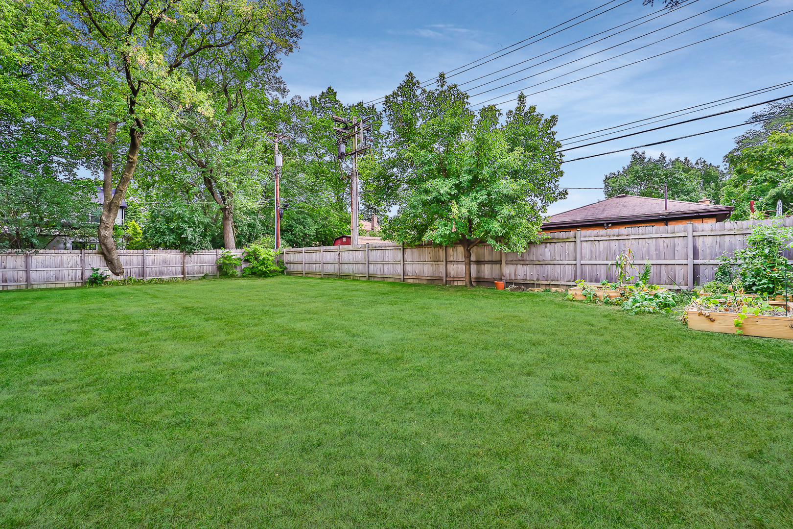 147 Herrick Road Riverside, IL 60546 - Photo 54 of 55 a view of a house with a backyard