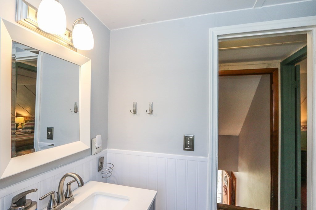 24 French Street Springfield, MA 01104 - Photo 35 of 41 a bathroom with a bathtub and a sink