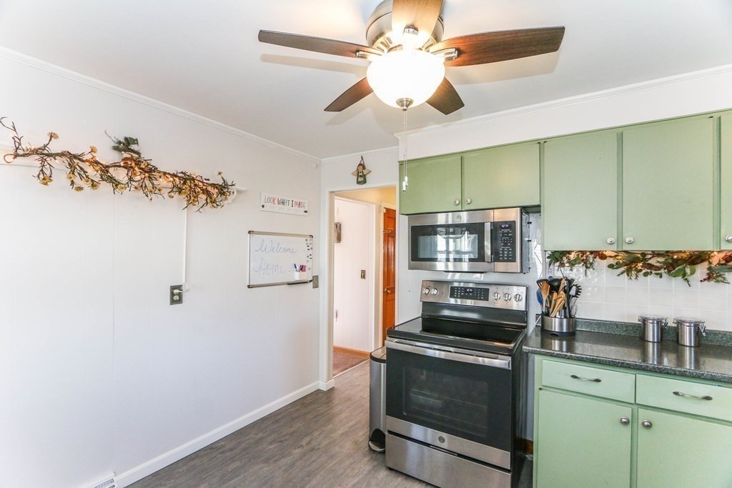24 French Street Springfield, MA 01104 - Photo 8 of 41 a kitchen with stainless steel appliances a stove a sink and a refrigerator
