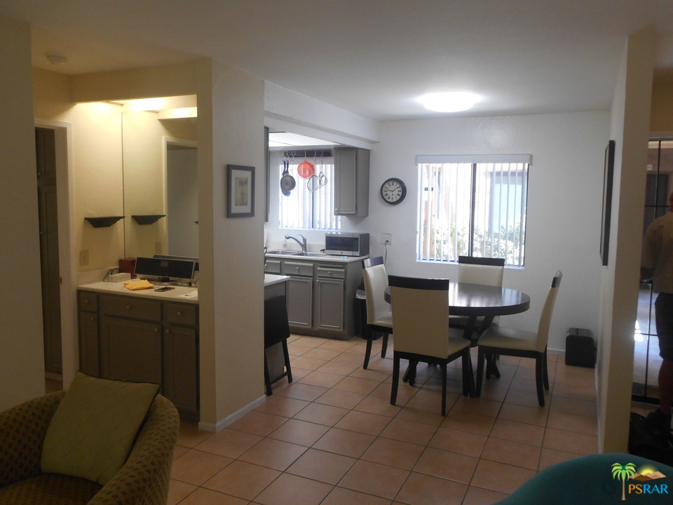 1050 Ramon Road, Unit 20 Palm Springs, CA 92264 - Photo 14 of 35 a view of a dining room with furniture and window
