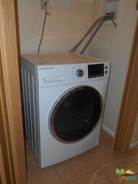 1050 Ramon Road, Unit 20 Palm Springs, CA 92264 - Photo 19 of 35 a utility room with dryer and washer