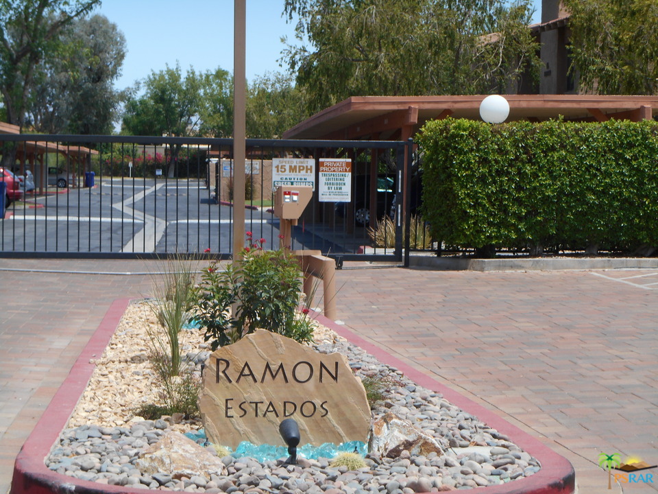 1050 Ramon Road, Unit 20 Palm Springs, CA 92264 - Photo 28 of 35 a view of a dinning table and chairs in patio