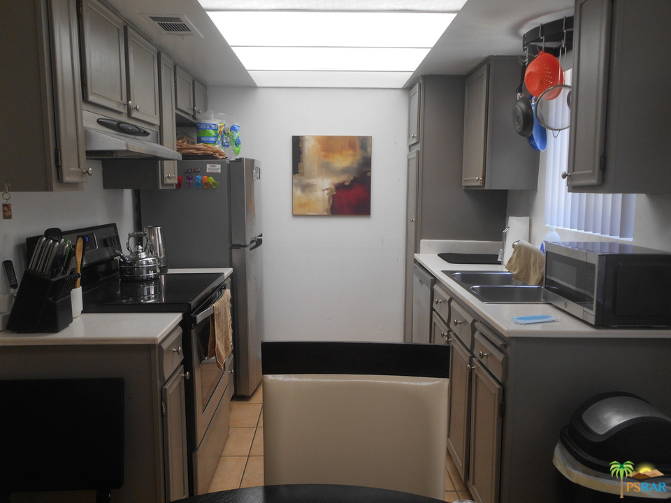 1050 Ramon Road, Unit 20 Palm Springs, CA 92264 - Photo 8 of 35 a room with storage and utility