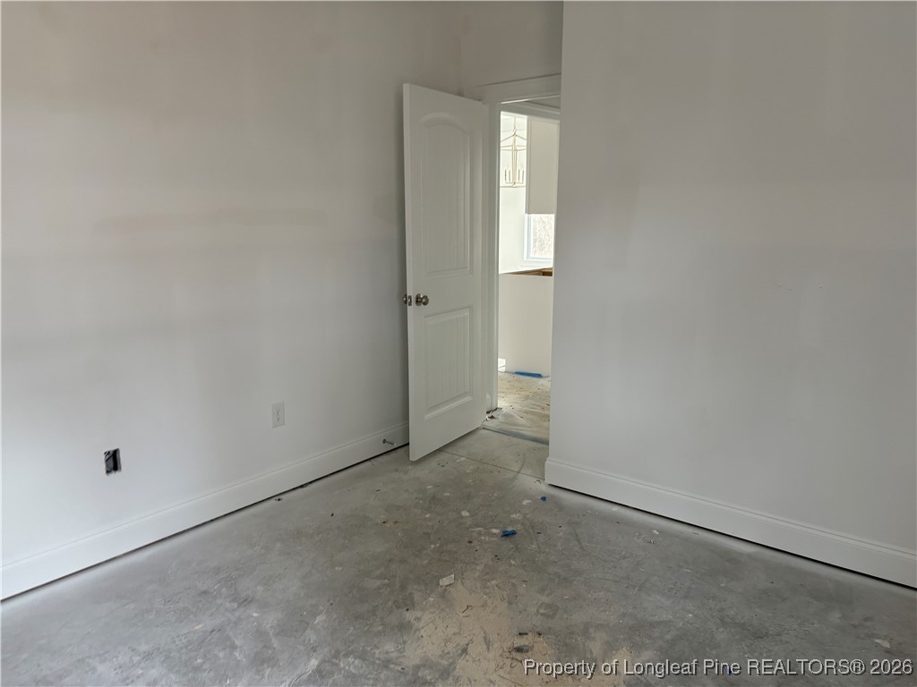 3223 Leaflet Church Road Broadway, NC 27505 - Photo 12 of 18 a view of an empty room with windows