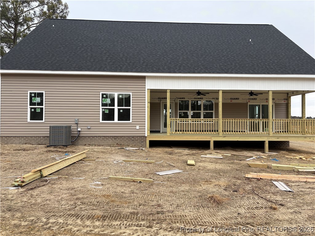 3223 Leaflet Church Road Broadway, NC 27505 - Photo 18 of 18 a view of a house with a large window