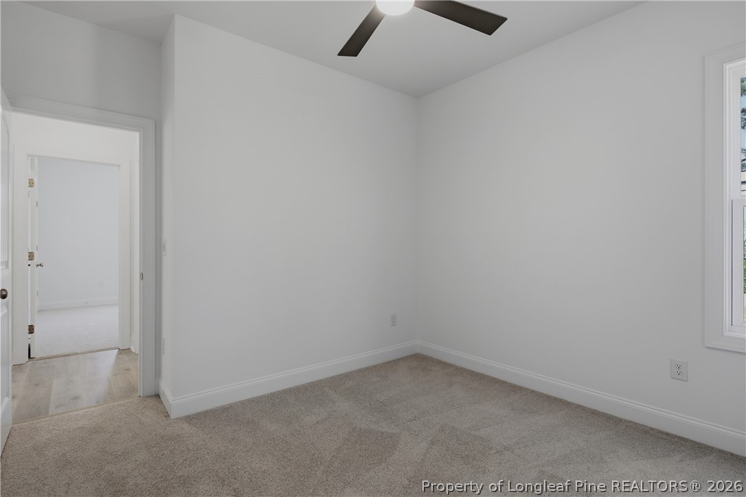 3223 Leaflet Church Road Broadway, NC 27505 - Photo 19 of 30 an empty room and a window