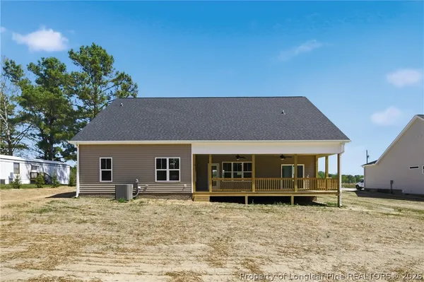a view of a porch and wooden floor