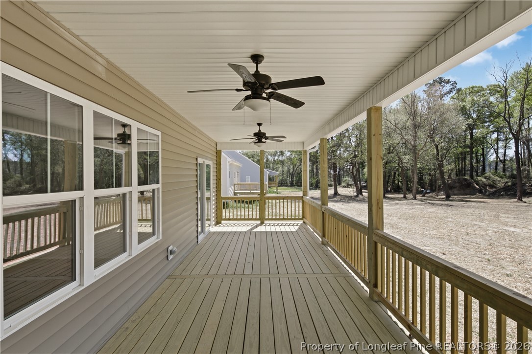 3223 Leaflet Church Road Broadway, NC 27505 - Photo 26 of 30 a view of a porch and wooden floor