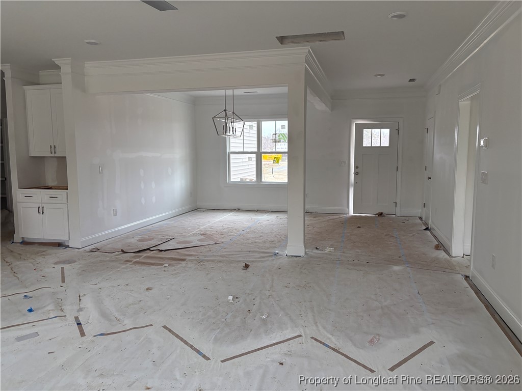 3223 Leaflet Church Road Broadway, NC 27505 - Photo 4 of 18 a view of livingroom with an empty space