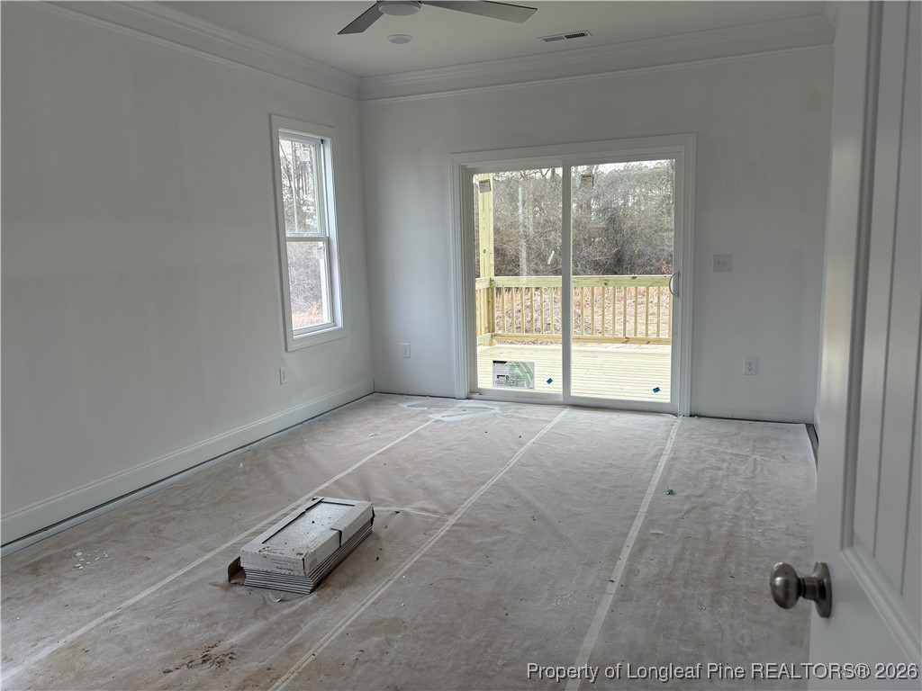 3223 Leaflet Church Road Broadway, NC 27505 - Photo 5 of 18 a view of an empty room with a window