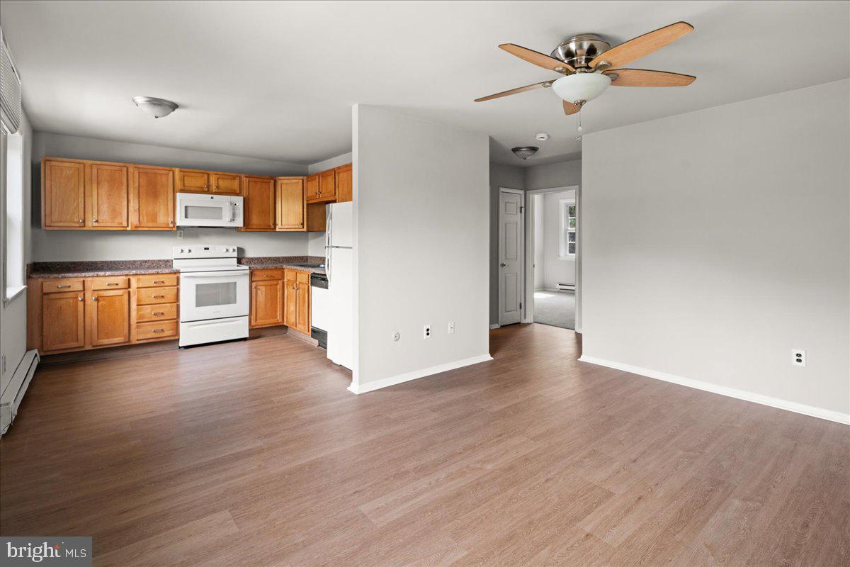 103 Deep Run Road, Unit B4 Dublin, PA 18917 - Photo 10 of 26 Fresh new laminate floor enhances the living room