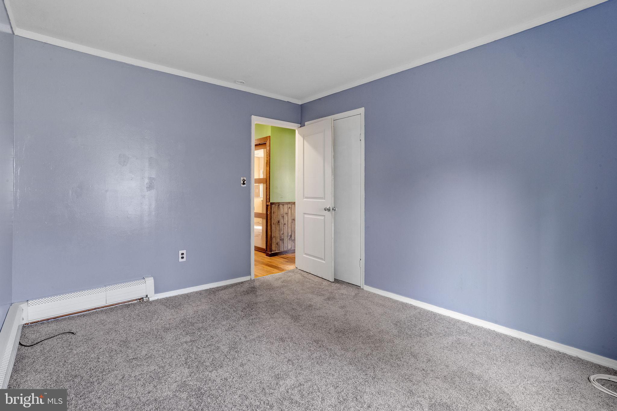 47 Farmbrook Drive Levittown, PA 19055 - Photo 15 of 28 an empty room with an empty space and a window