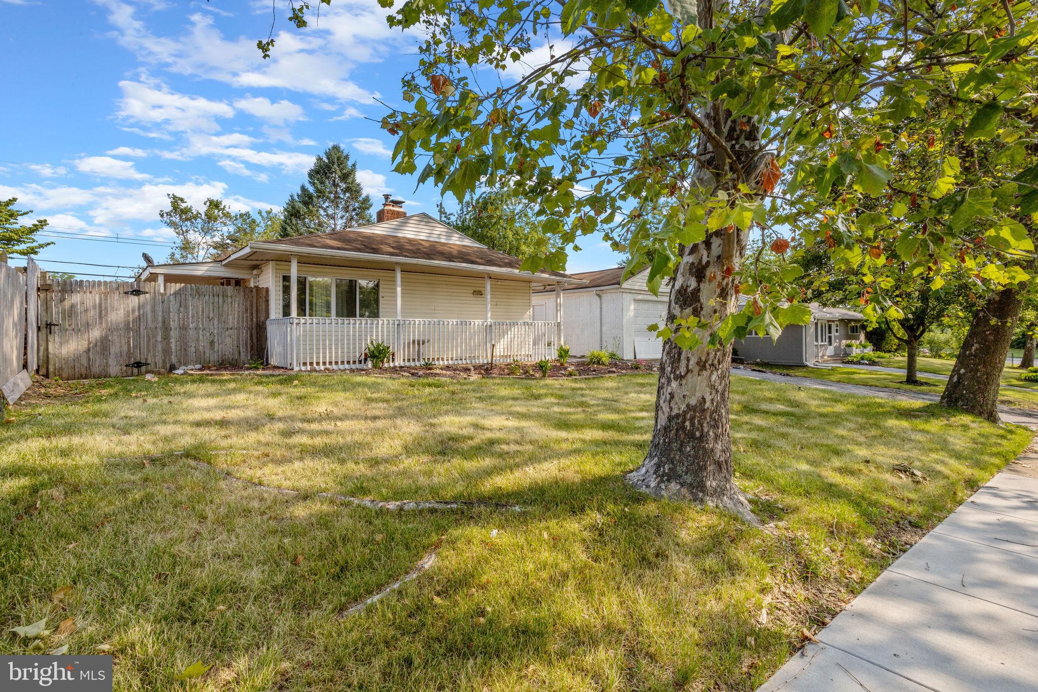 47 Farmbrook Drive Levittown, PA 19055 - Photo 23 of 28 a view of a house with a yard