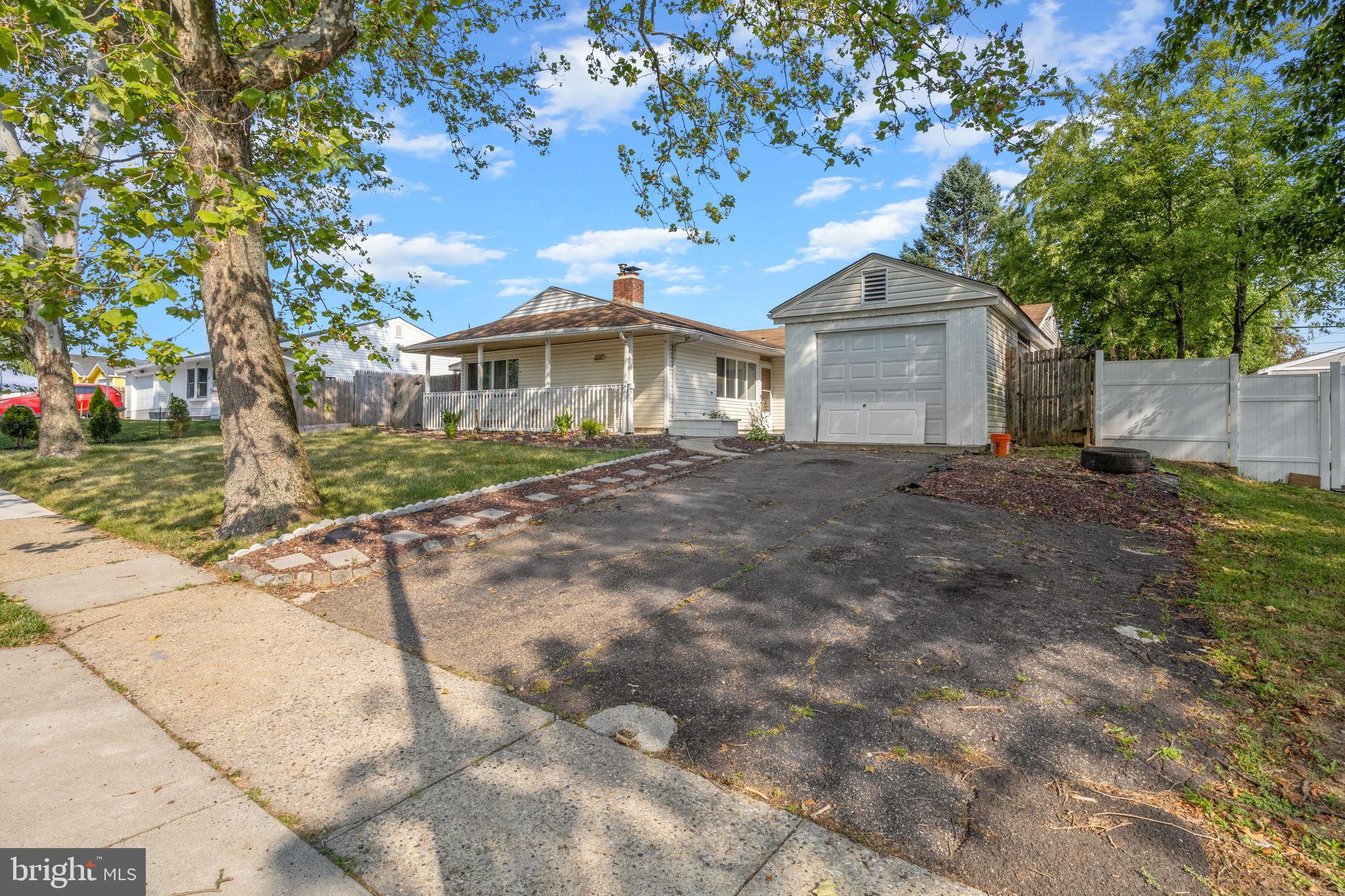 47 Farmbrook Drive Levittown, PA 19055 - Photo 24 of 28 a view of a house with a yard