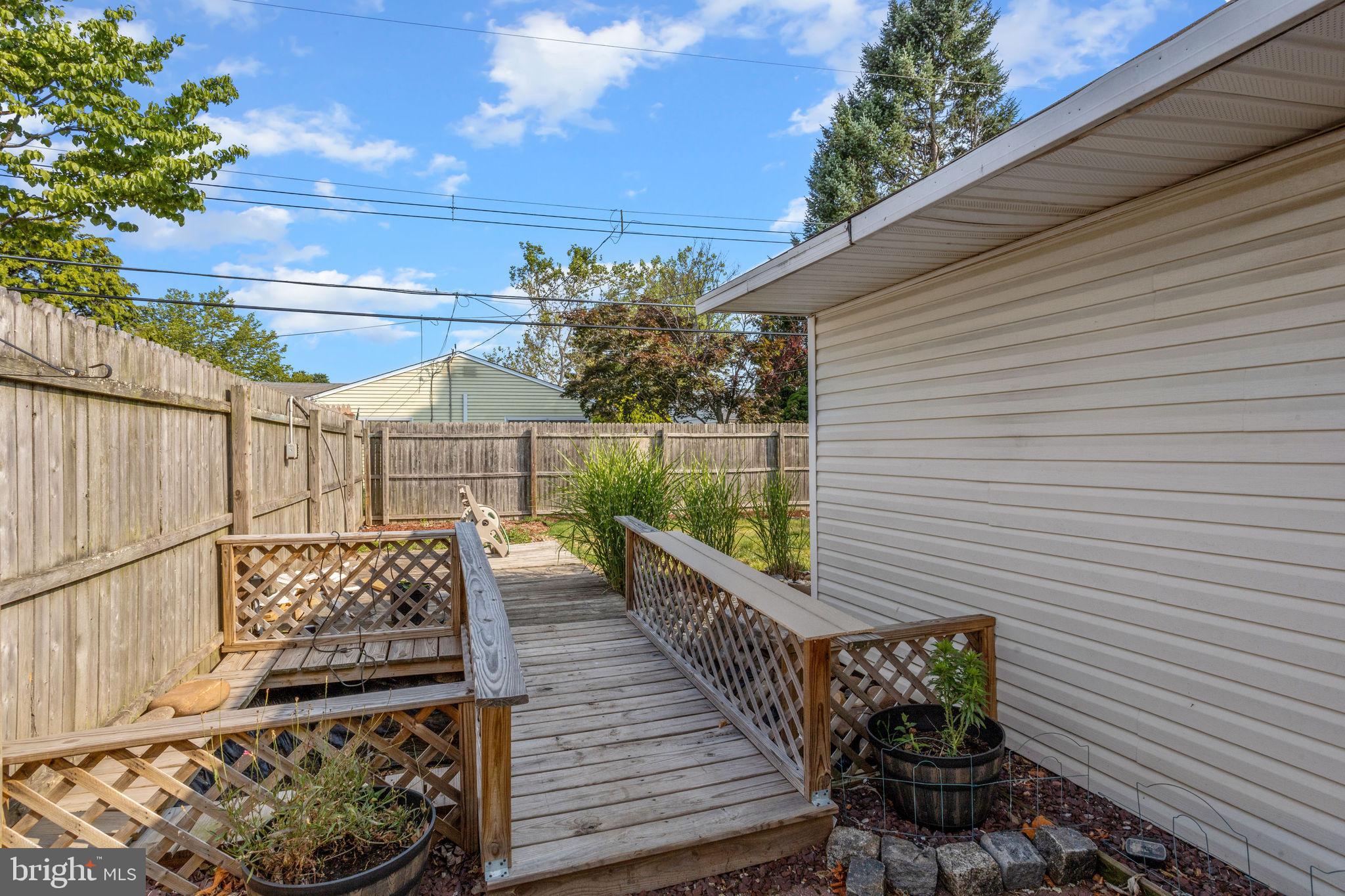 47 Farmbrook Drive Levittown, PA 19055 - Photo 26 of 28 a balcony with wooden floor