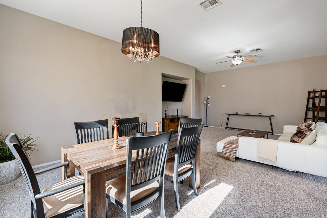 49418 Wayne Street Indio, CA 92201 - Photo 4 of 22 a view of a dining room with furniture