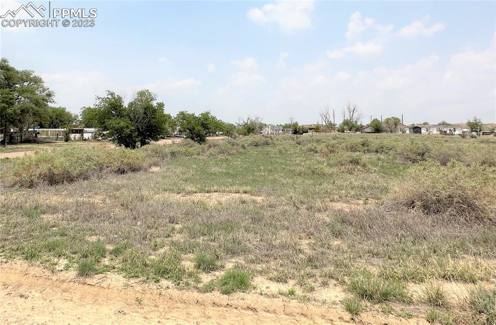 Wilson Avenue Boone, CO 81025 - Photo 3 of 8 a view of a dry yard