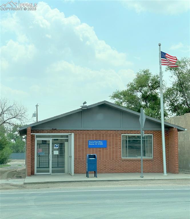 Wilson Avenue Boone, CO 81025 - Photo 5 of 8 a front view of a house with a garden