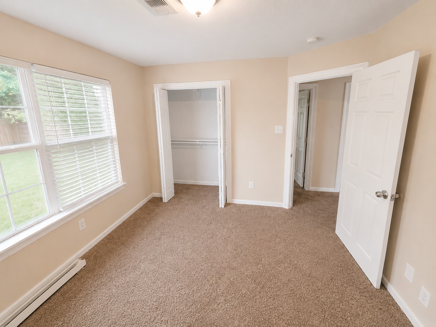 12926 Abalone Way Houston, TX 77044 - Photo 13 of 15 a view of a livingroom with an empty space and a window