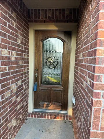 a aerial view of a house with a yard