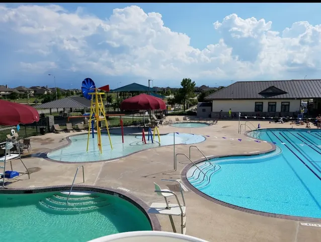 a view of a yard in front of the house