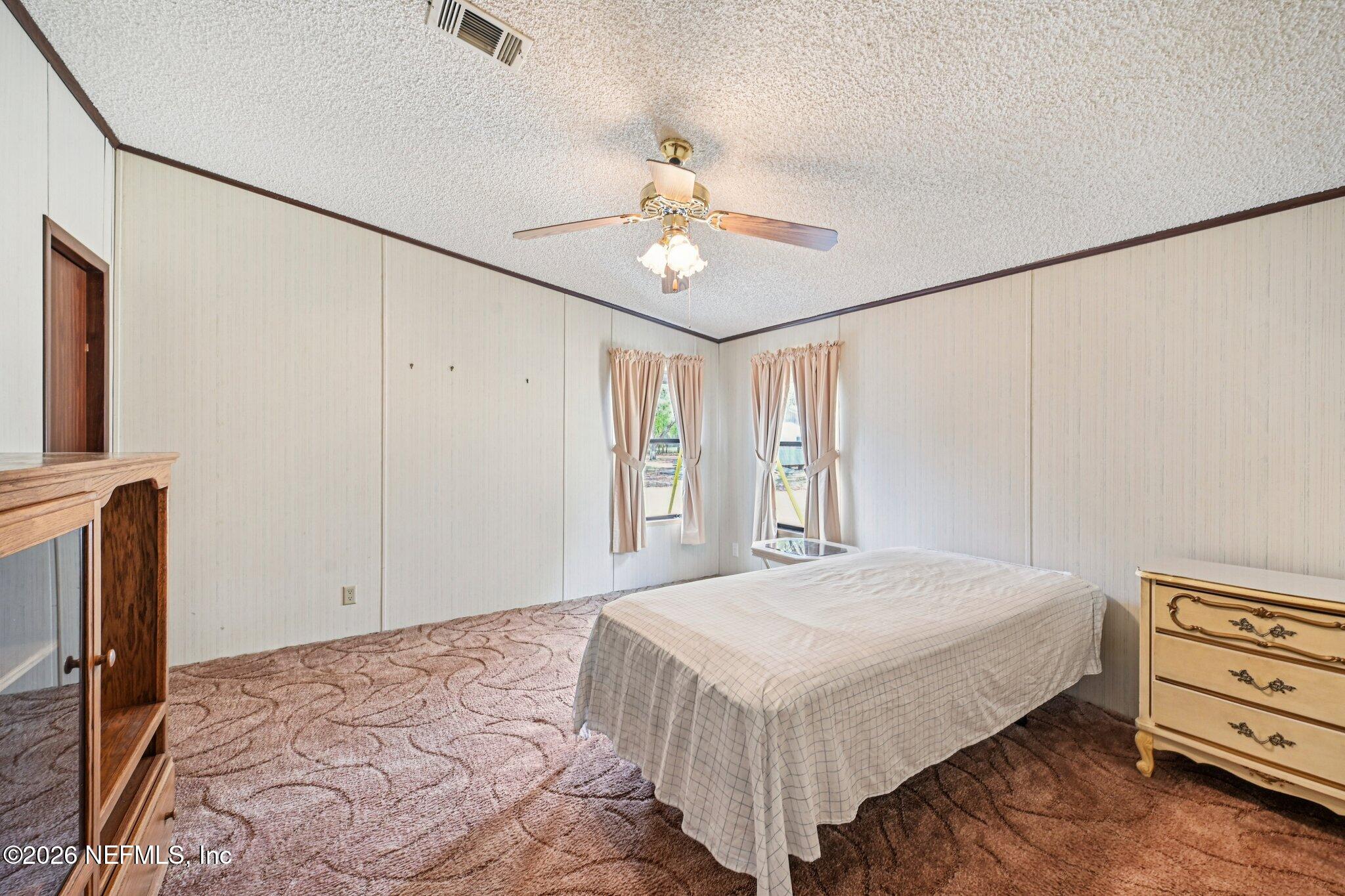 128 Sesame Street Middleburg, FL 32068 - Photo 41 of 66 Large Guest Bedroom