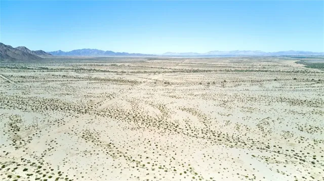 a view of ocean and mountain