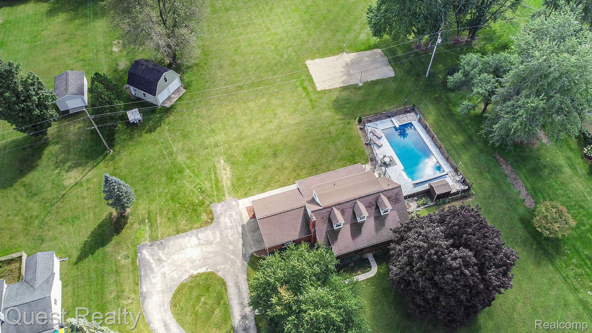 9290 Allen Road Clarkston, MI 48348 - Photo 11 of 56 20x20 2-story pole barn, pool and volleyball!
