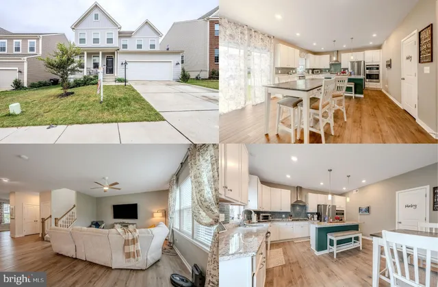 a living room with lots of furniture and kitchen view