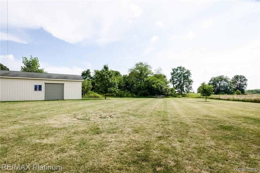 5655 West Coon Lake Road Howell, MI 48843 - Photo 31 of 36 031-Rear_View-4613656-medium.jpg