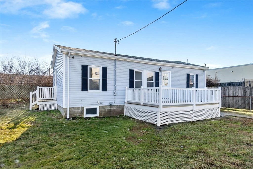 35 Russell Street Fall River, MA 02721 - Photo 20 of 27 a view of a house with a yard