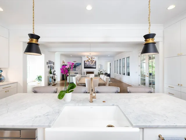 a kitchen with a sink and cabinets
