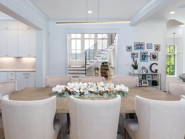 a white bath tub sitting in a bathroom next to a window