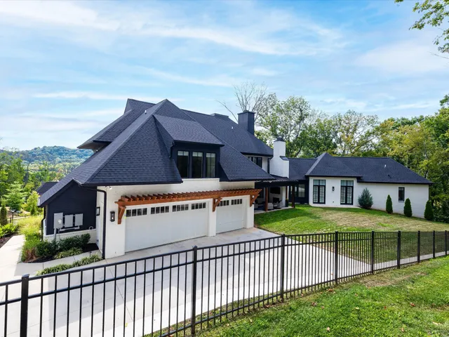 an aerial view of a house with a garden
