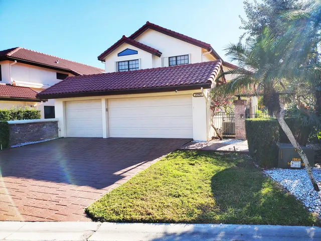 a view of backyard of house