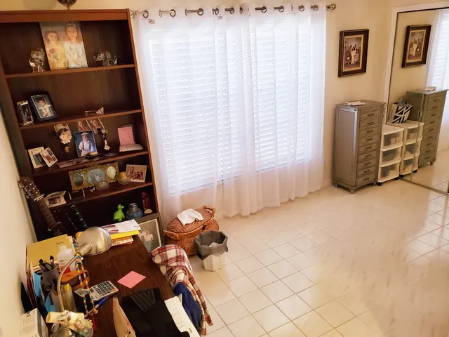 a view of livingroom with furniture and white walls
