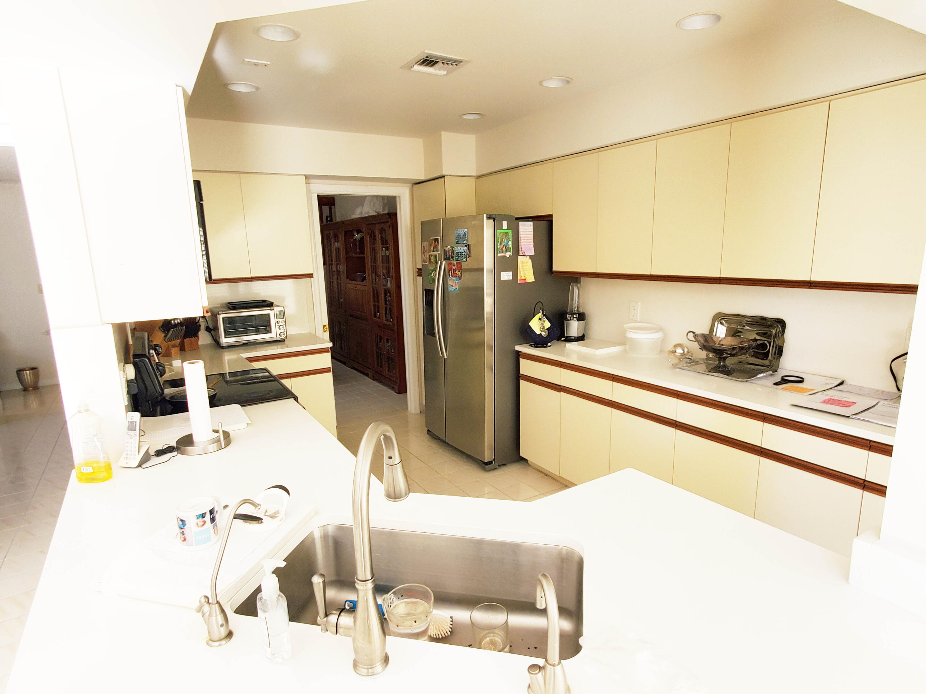 21742 Club Villa Terrace Boca Raton, FL 33433 - Photo 5 of 38 a kitchen with a sink appliances and cabinets