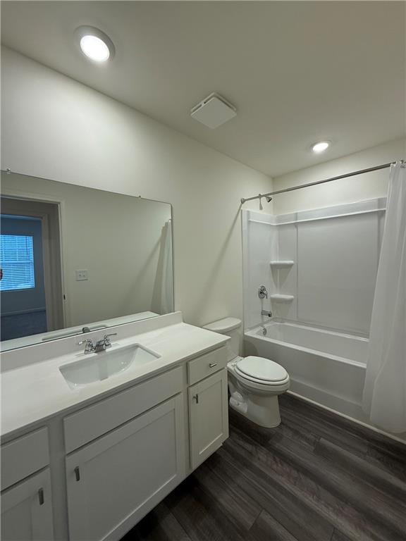 306 Rydal Way Winder, GA 30680 - Photo 11 of 19 a bathroom with a double vanity sink toilet and shower