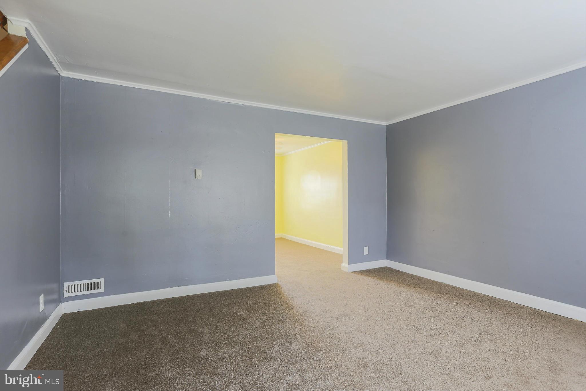 845 Benninghaus Road Baltimore, MD 21212 - Photo 5 of 19 an empty room with a natural light