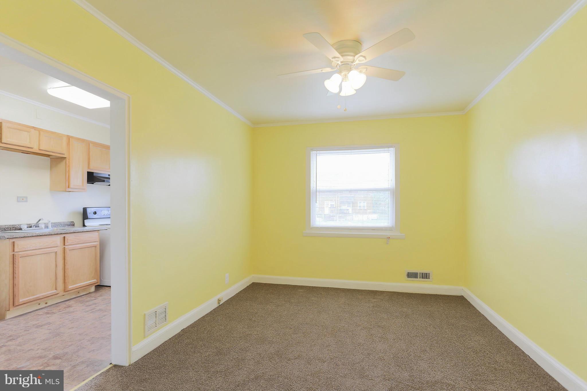 845 Benninghaus Road Baltimore, MD 21212 - Photo 7 of 19 a view of a kitchen with a sink a window and a kitchen