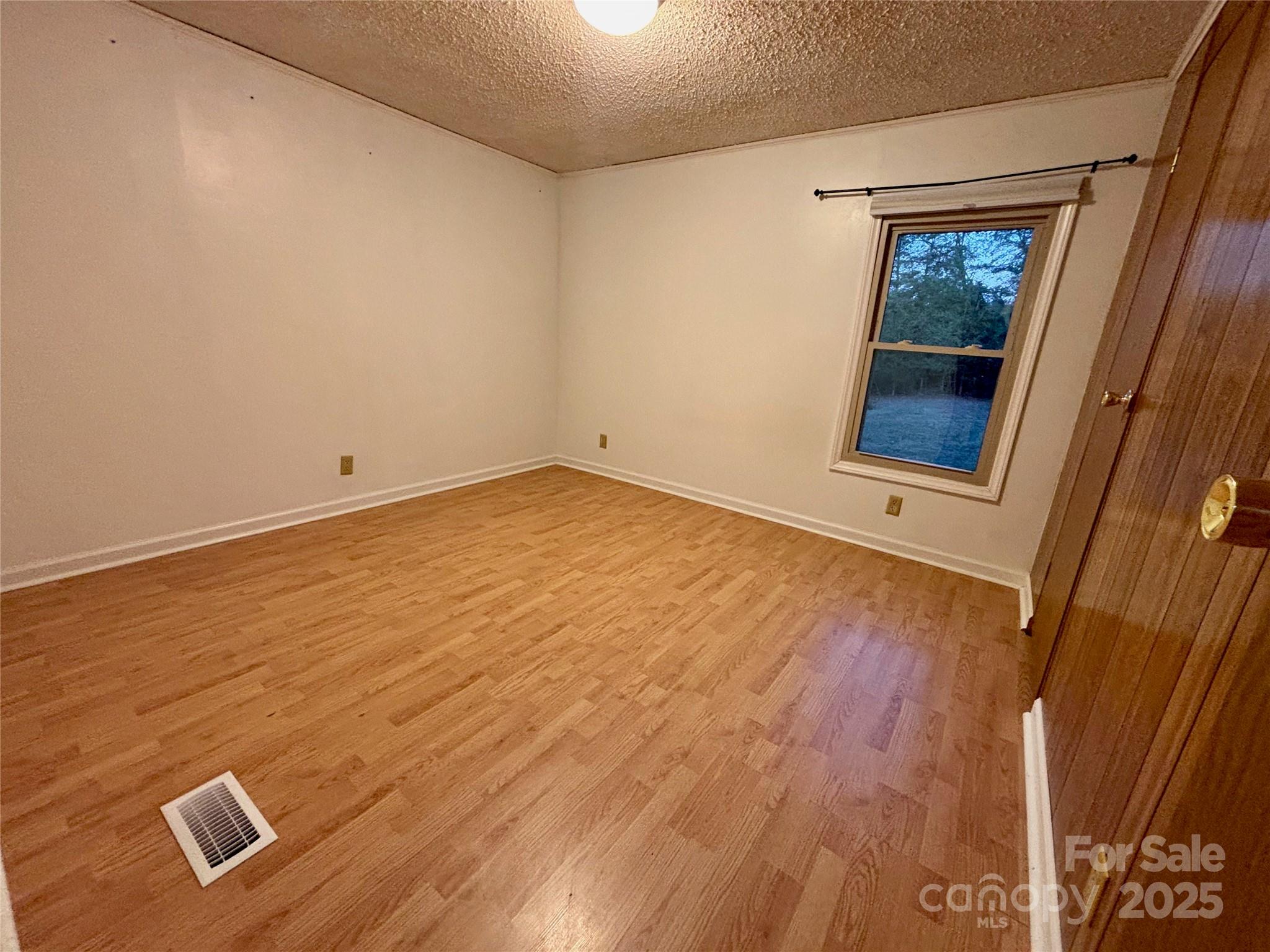 298 West B Phindeck Road Bostic, NC 28018 - Photo 27 of 34 an empty room with windows